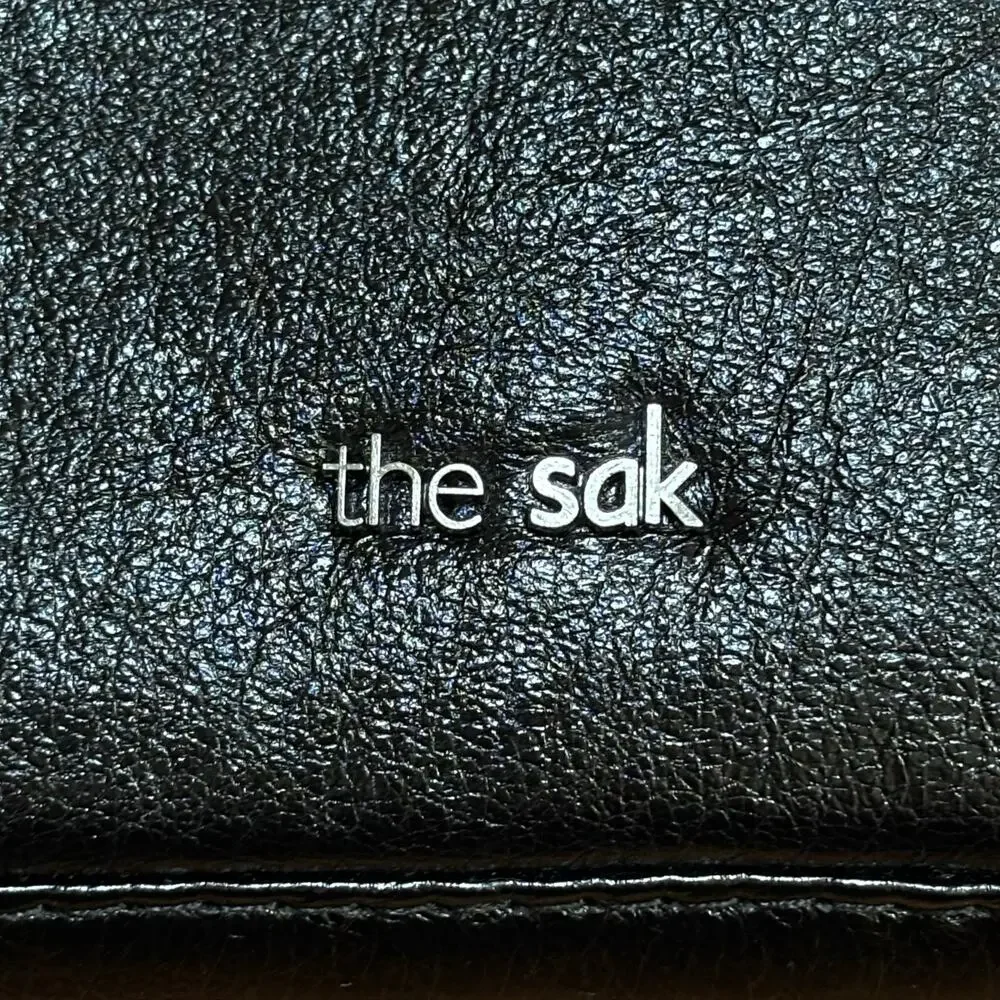 THE SAK black leather clutch purse wristlet crossbody bag zip around wallet